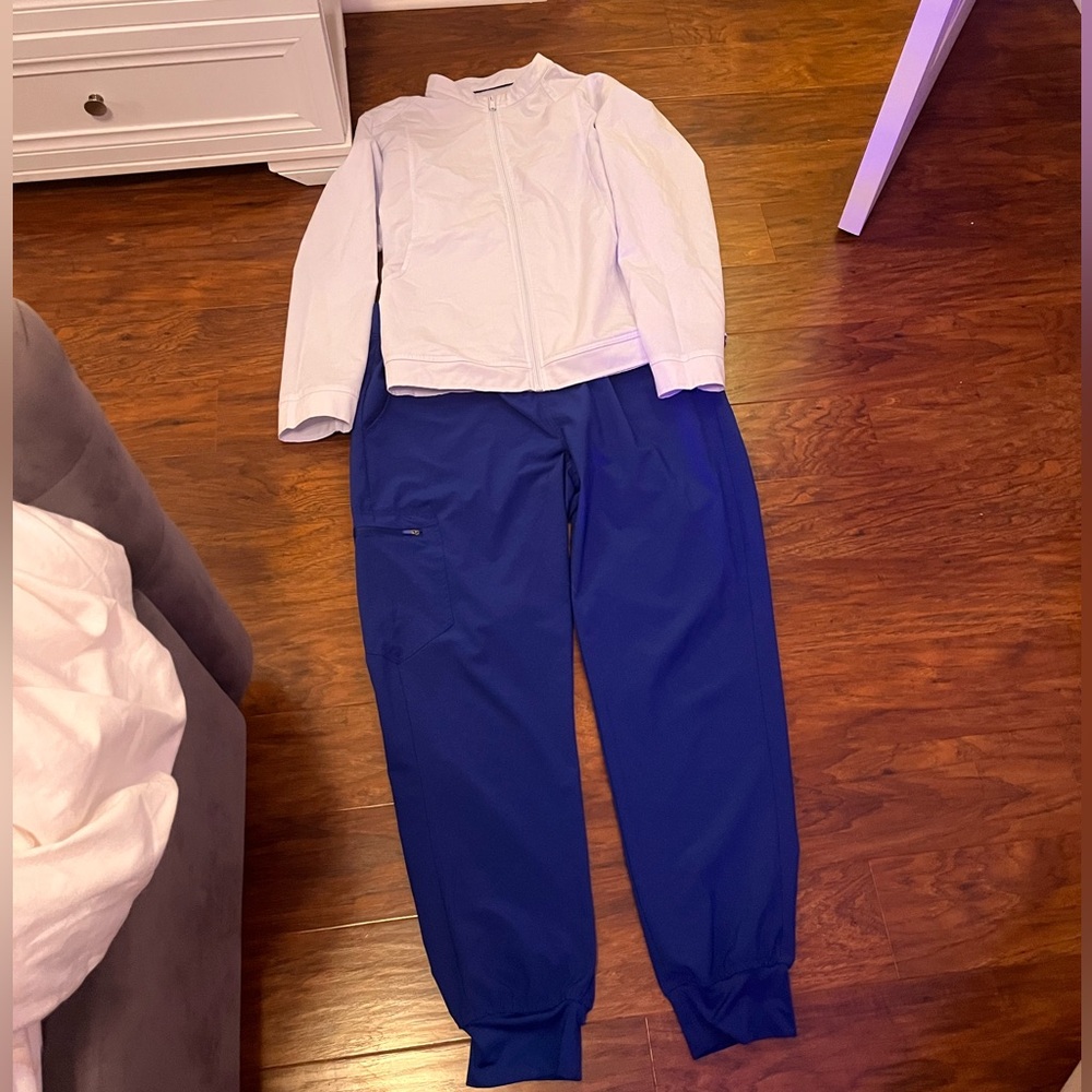 WHITE SCRUB JACKET & TIGHT ANKLE BLUE SCRUB PANTS